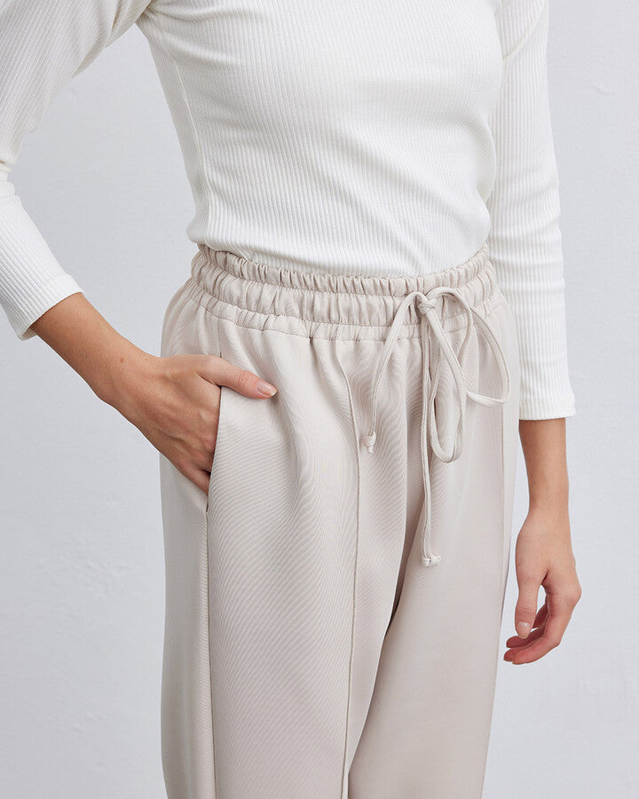 Beige Scuba Elastic Pocket Carrot Cut Trousers